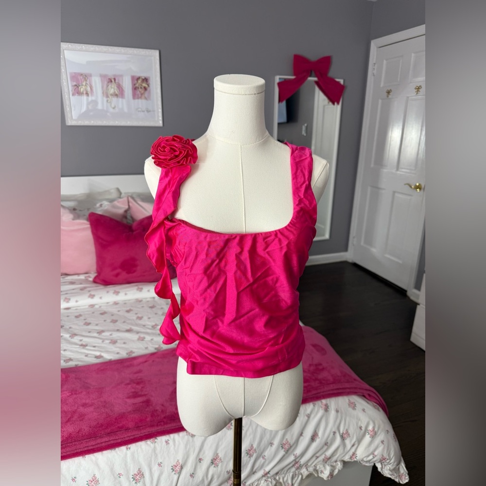 Vibrant Pink Sleeveless Top with Floral Accent